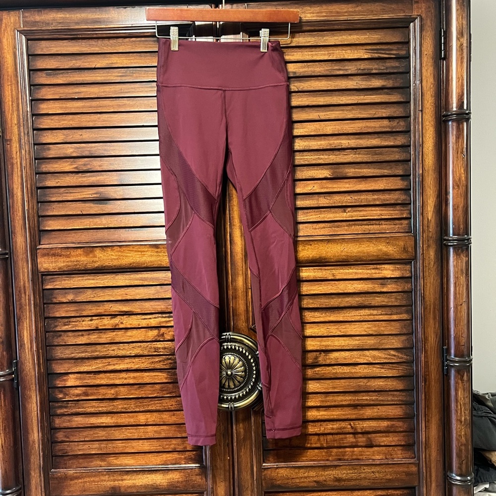 Lululemon Athletica Burgundy Leggings with Mesh Sleek Design accents. Size 4